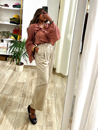 Pantalone con piega